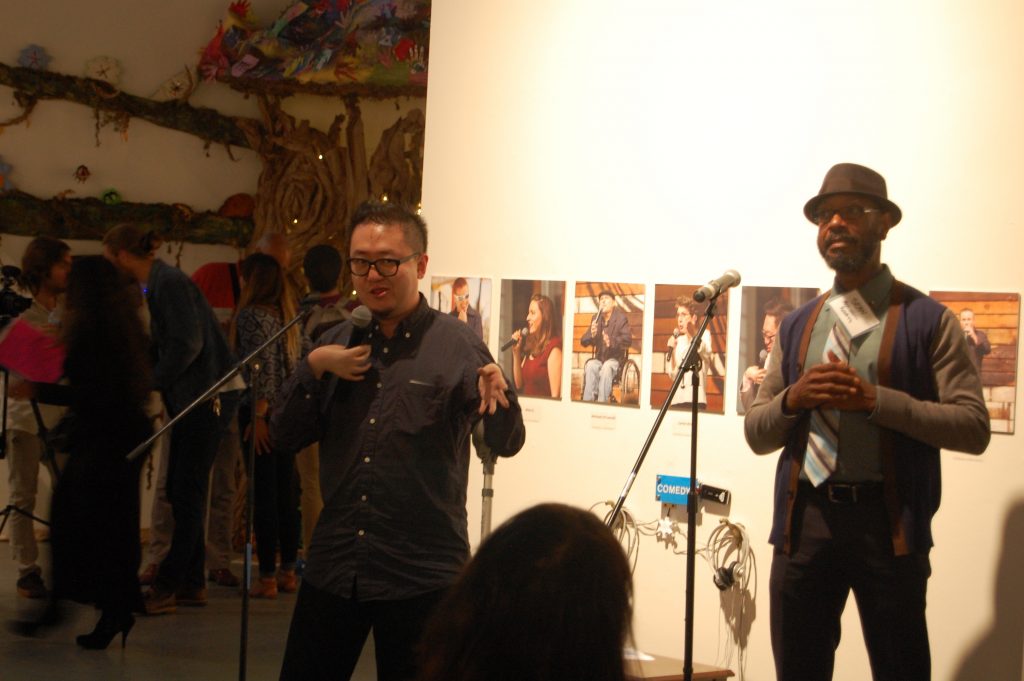 Asian American Steve Lee performing at the Opening Night of DIS/PLAY, with ASL interpretation