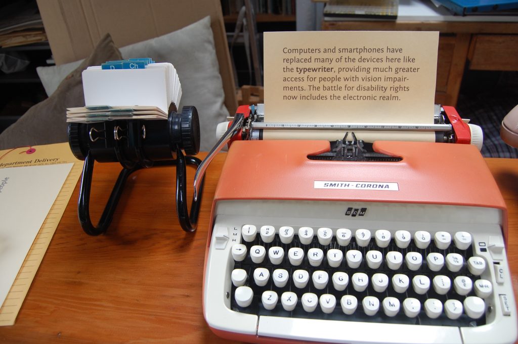 A 1970s typewriter to highlight how far accessibility has come, though there is still "Room for improvement"