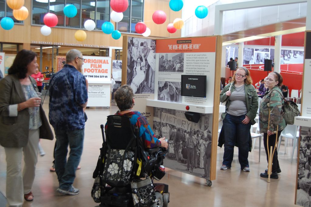 Visitors include many wheelchair riders at the Ed Roberts Campus on opening day